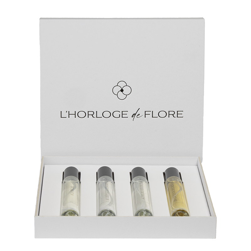 Coffret avec les 4 parfums de la collection Les Signatures Créatives de la marque française l'Horloge de Flore.